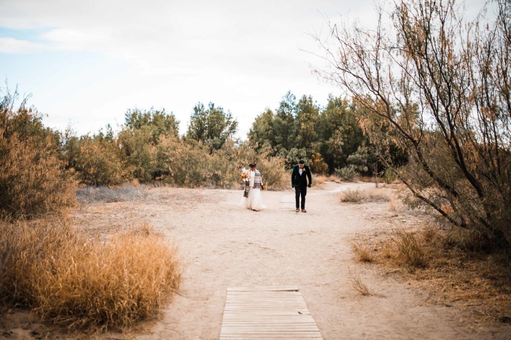 Bride and groom exploring big bend during their elopement