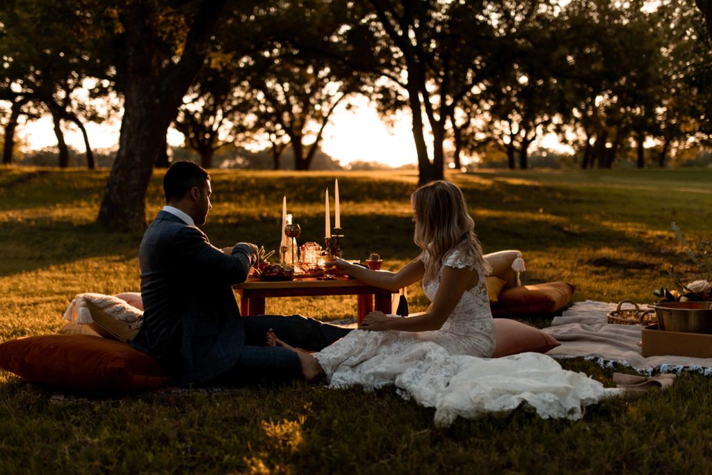 Couple enjoying a romantic picnic in Texas.