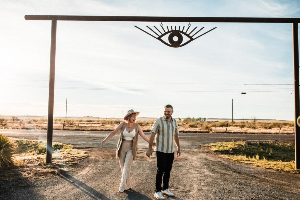 Couple dancing at El Cosmico in Marfa Texas during their engagement session