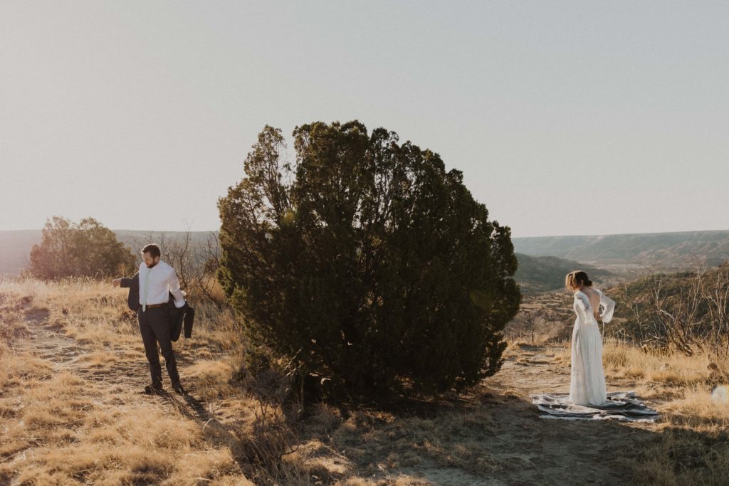 Couple getting ready for their Palo Duro Canyon Elopement

