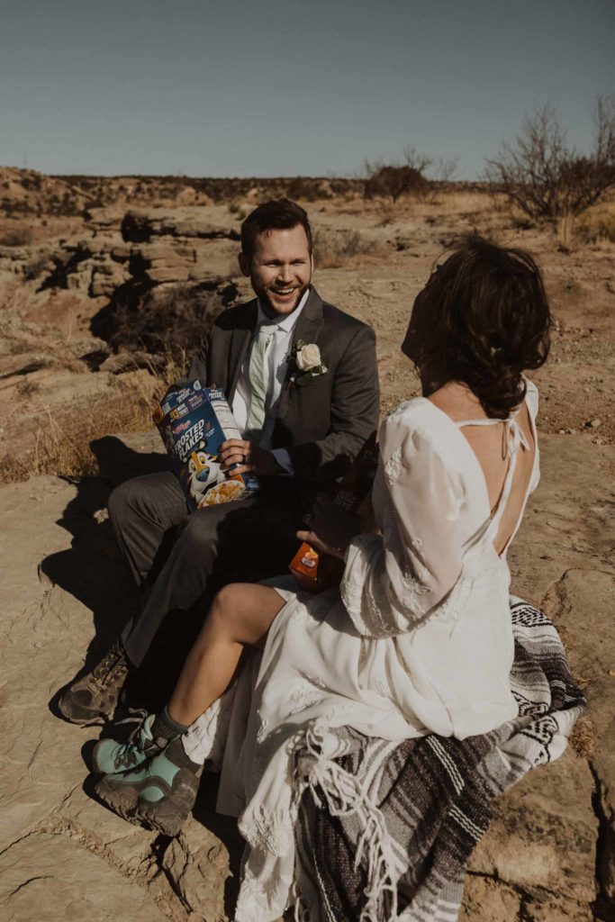Couple eating cereal during their Palo Duro Canyon Elopement