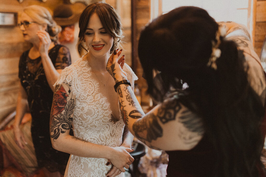 bride gets ready at Sekrit Theater vintage greenhouse wedding