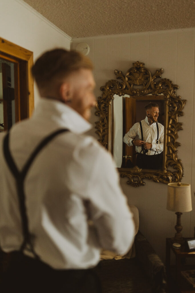 groom gets ready at Sekrit Theater vintage greenhouse wedding