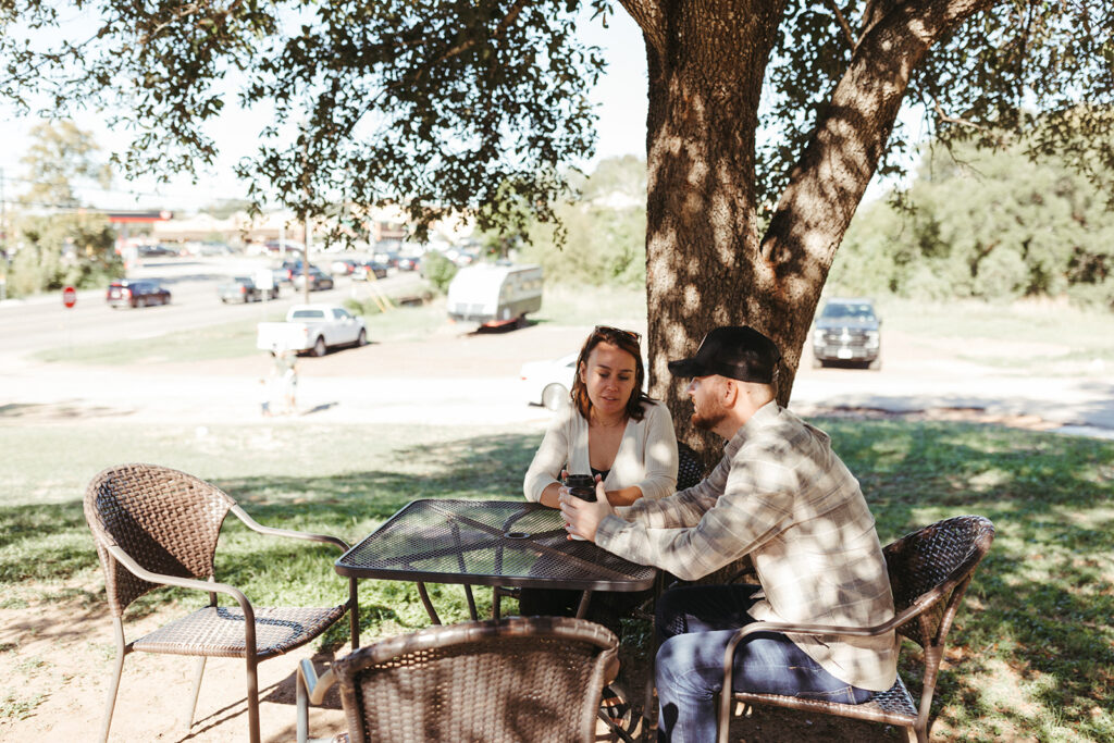 couple gets coffee together at Texas elopement at Inks Lake in Texas