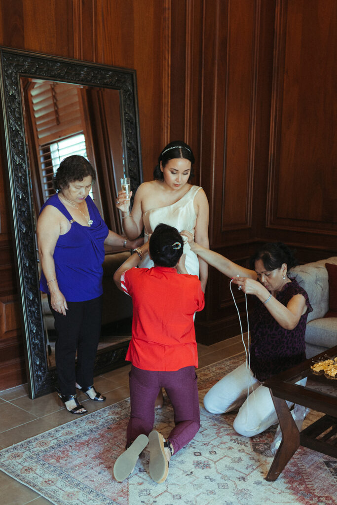 bride gets ready with family
