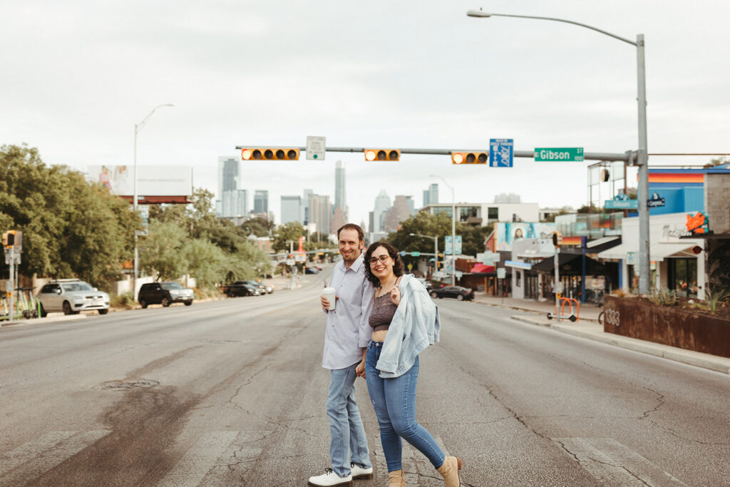 Austin engagement photographer captures couple crossing street