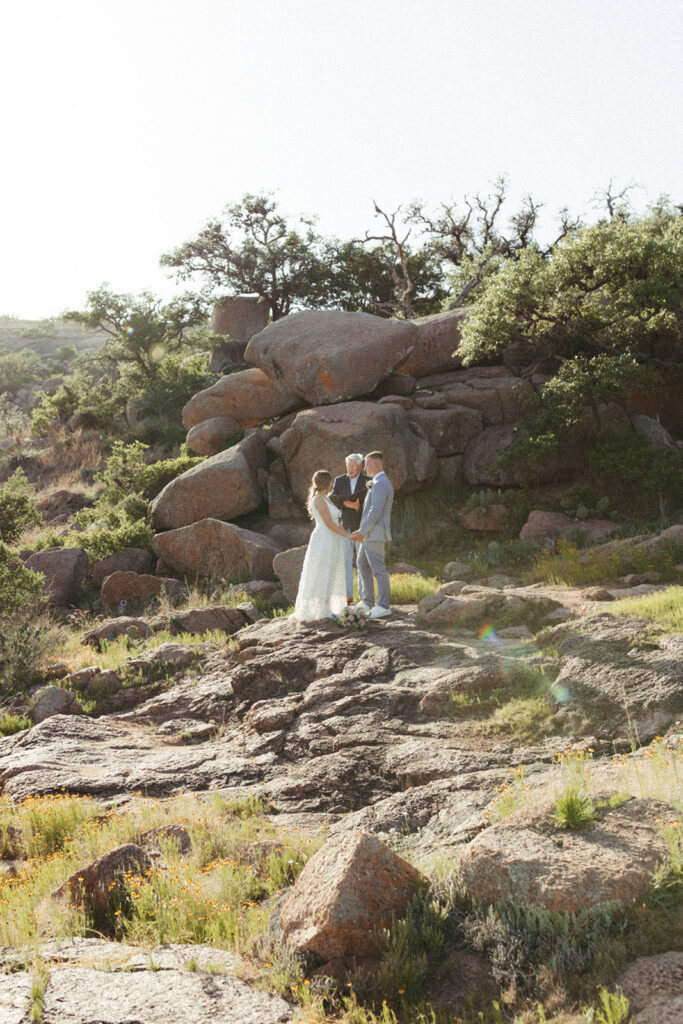 couple exchanges vows at sunset Texas elopment 