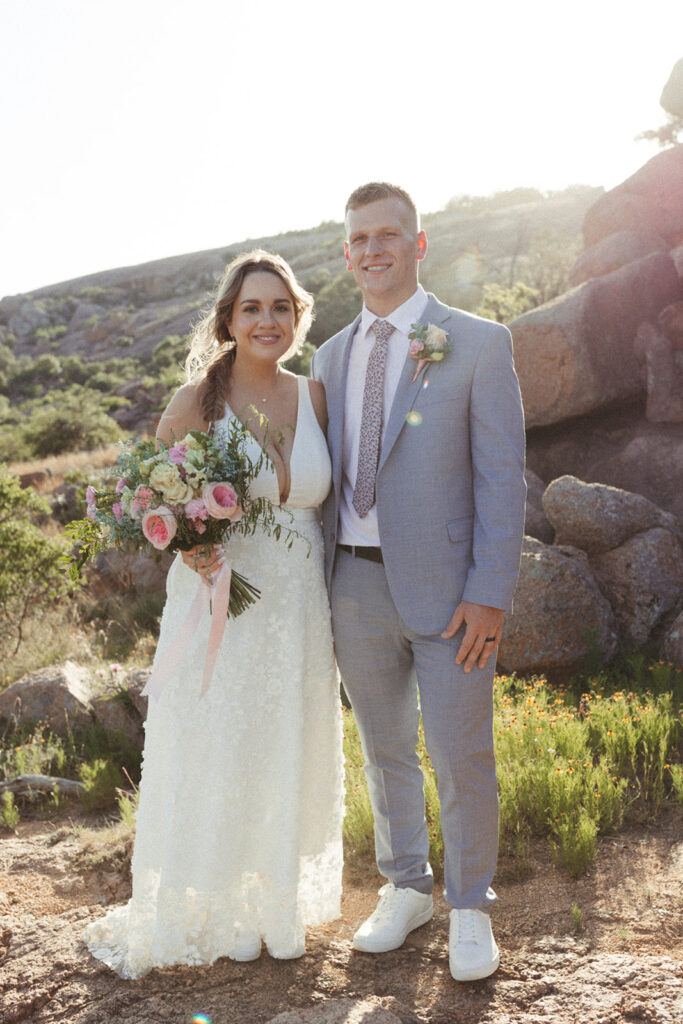 couple embraces at Texas Hill Country wedding elopement