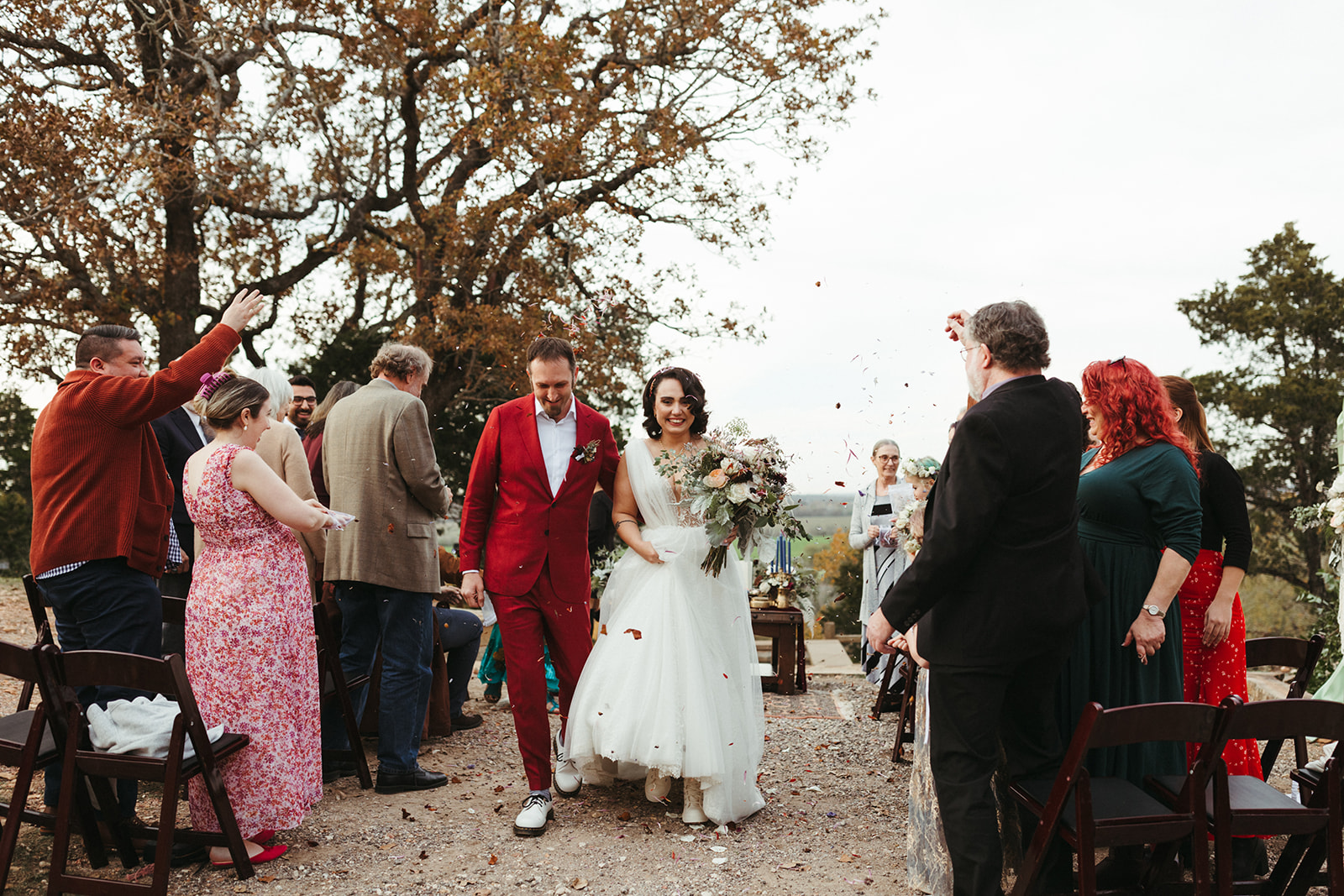 couple walks down aisle at Shiraz Garden wedding in Texas