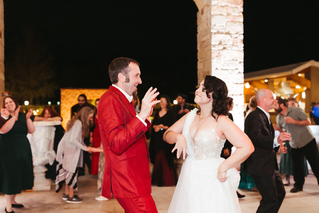 couple dances at outdoor wedding reception 