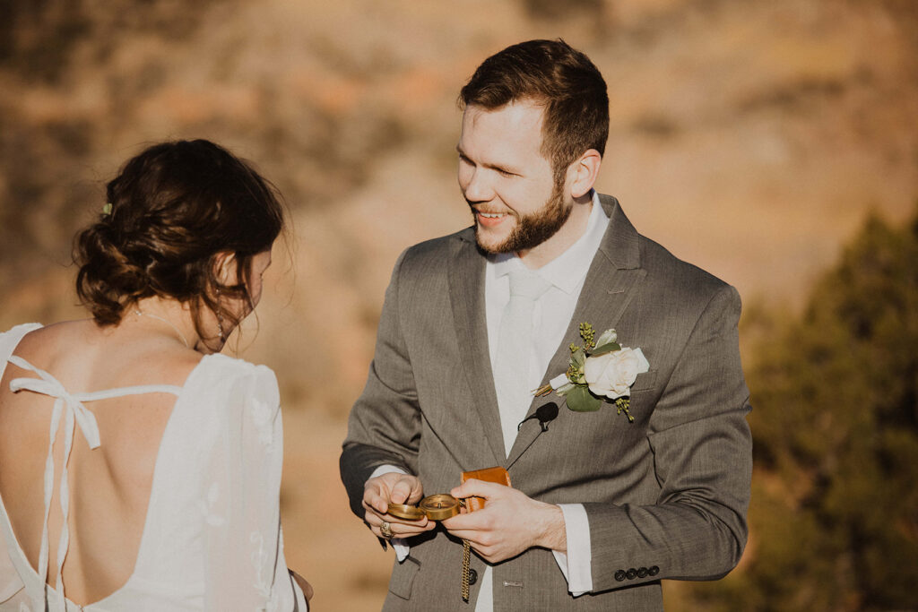 couple exchanges gifts during sunrise Texas elopement