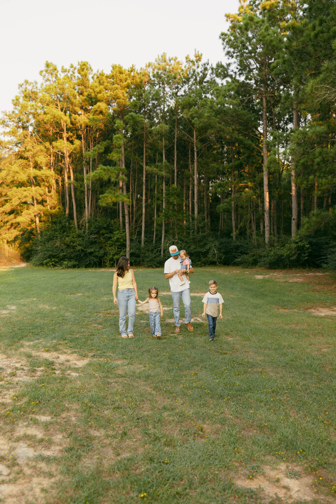 Family walking through a park in The Woodlands Texas