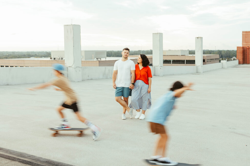 Family skateboarding during a family photo shoot with a woodlands lifestyle photographer